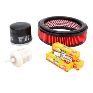 Nissan Pao Annual Service Kit Comprising Of Round Red Pleated Air Filter, 4 Spark Plugs In Yellow Boxes, Black Round Oil Filter and Opaque Cylindrical Fuel Filter