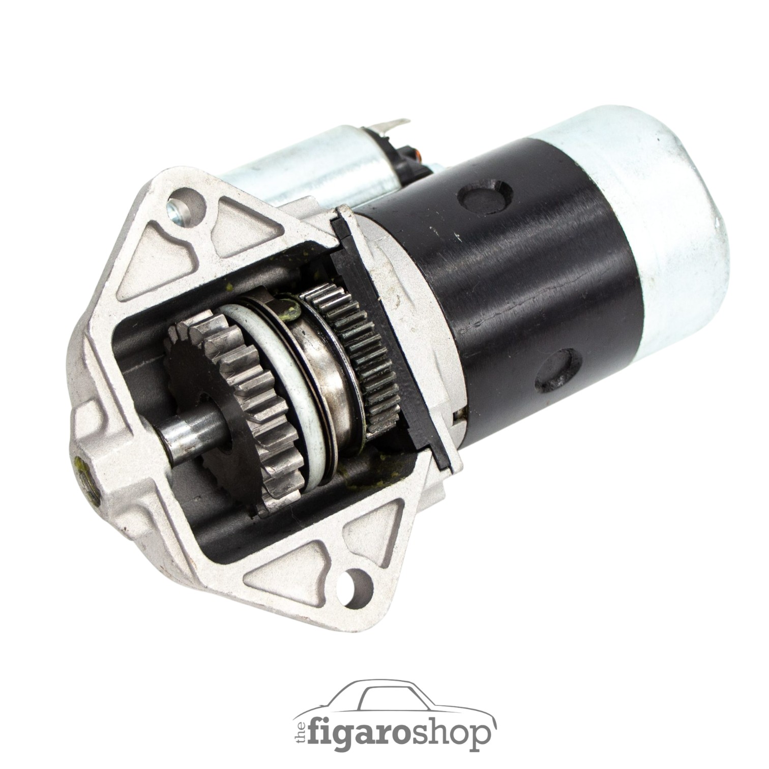 Nissan Figaro Starter Motor With Silver End Cover, Black Motor Casing and Silver Zinc Plated Remote Mounted Solenoid Underside View Showing Engagement Gears